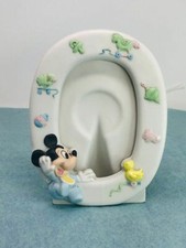 Micky Mouse photo frame that features Baby Micky Mouse and his Nursery Rhymes An