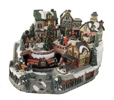 Weihnachtsszene Winterdorfszene mit fahrendem...