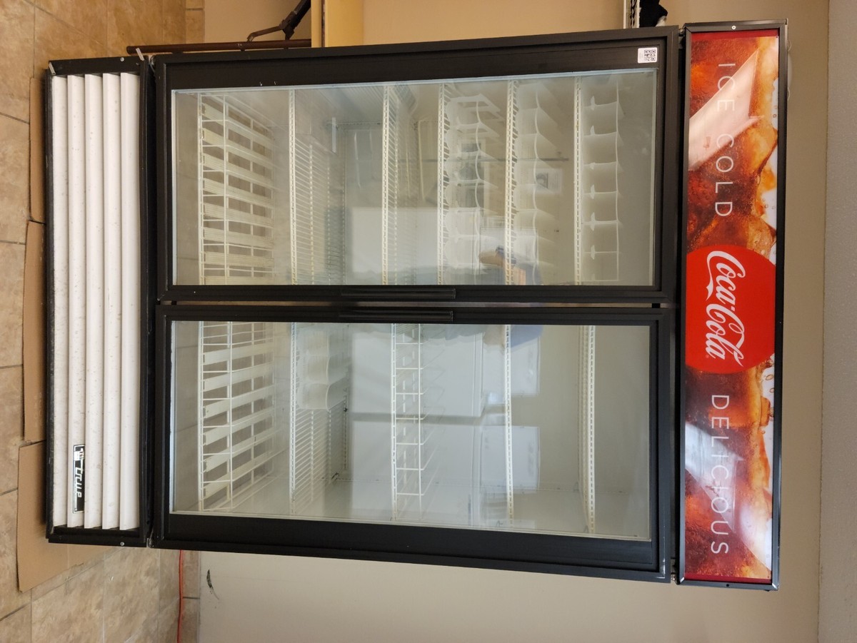 White coke branded, true refrigerator soda display. Model 1959403