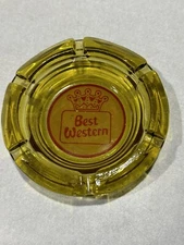 VINTAGE BEST WESTERN HOTELADVERTISING GLASS AMBER-ASHTRAY/ NO DAMAGE. 6 SPOTS
