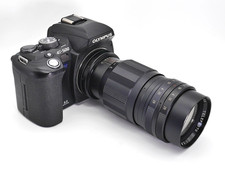 Olympus E-500 DSLR Four Thirds CCD Sensor Digital Camera Kit + Aico 135mm Lens