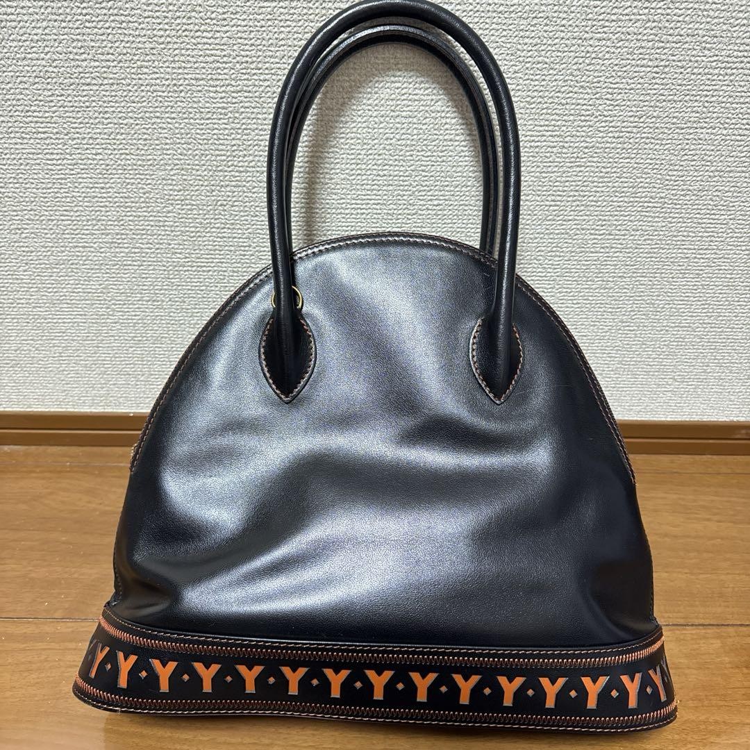 Borsa vintage Yves Saint Laurent elegante danneggiata