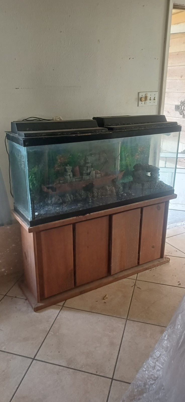 Image of Preowned large glass fish aquarium tank with wooden cabinet stand