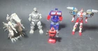 Lot of five vintage robot toys Transformers, Mechagodzilla, Zoids