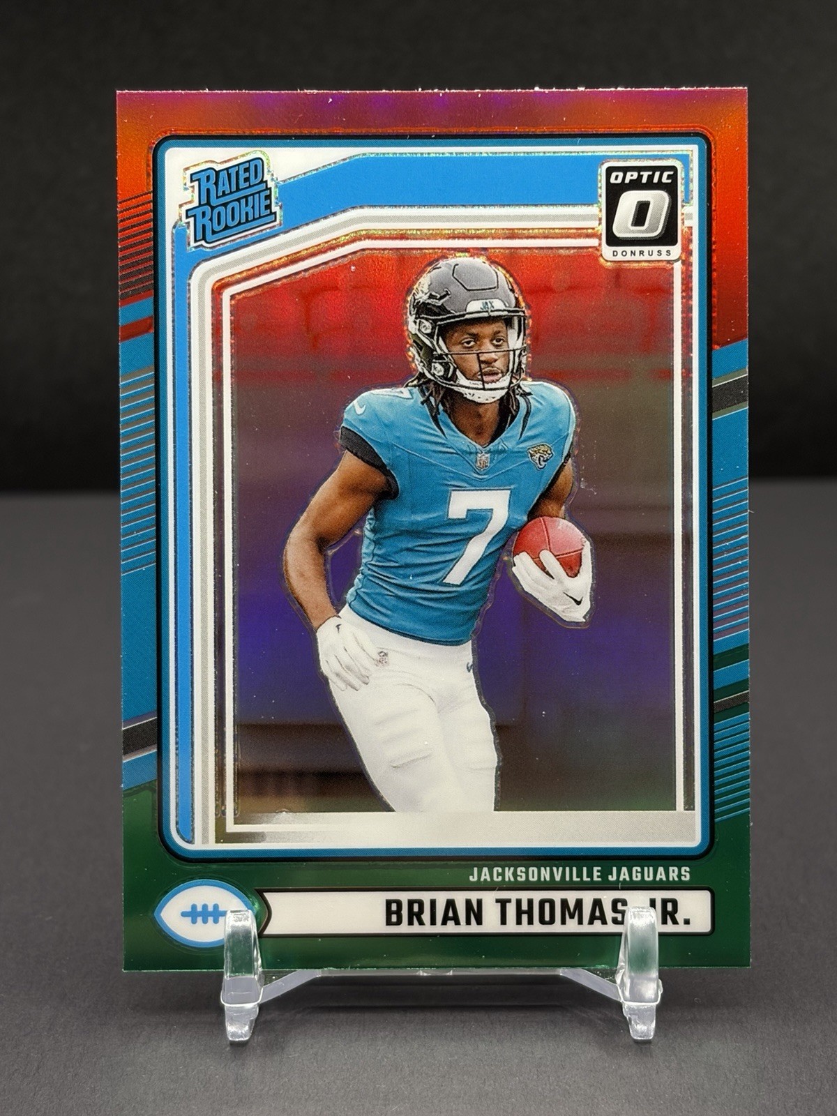 2024 Panini Donruss - Rated Rookie Brian Thomas Jr. Optic Preview Red/Green (RC)