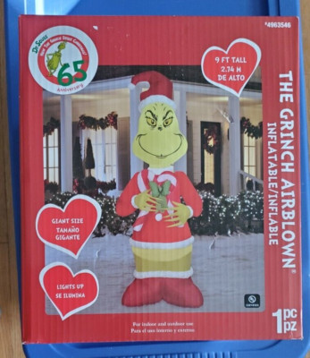 Grinch Holding Candy Canes  9-ft. Christmas Light Up LED Airblown Inflatable