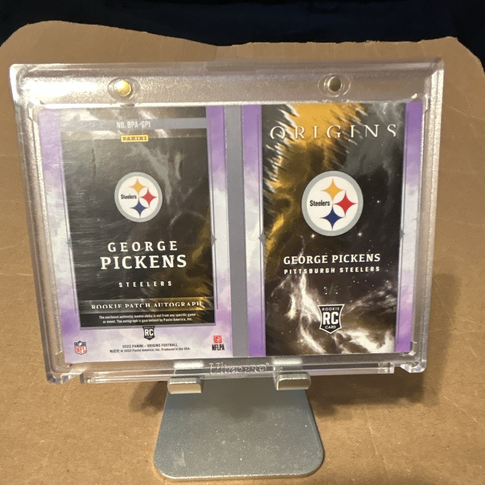 2022 Panini Origins - Rookie Booklet Patch Auto George Pickens /5 (AU, MEM, RC) view 2