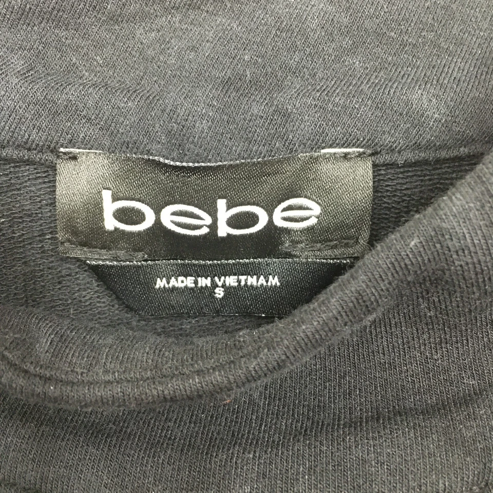 Mono BEBE para mujer talla pequeña negro cuello falso recortado manga corta cordón Foto 2 de 4