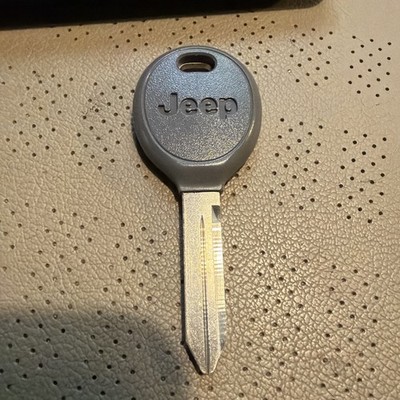 Genuine Mopar Key 05013807AD