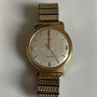 Vintage Timex Electric Watch 35mm Gold Tone, Linen Dial, Stretch band