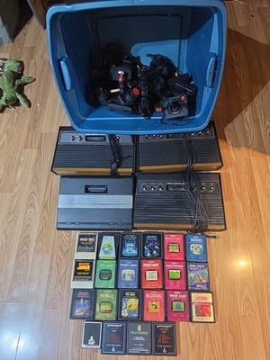 3 Atari 2600 & 1 7800 Consoles 3 Blk & Wood 1 Blk & Silver, 12+paddles 65 Games 