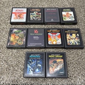 Atari 2600 System Bundle with Console, 30 Games, Joystick, Paddles, and More LOT