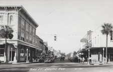 Bay St Eustis FL cars Coca Cola street view 1940 - RPPC Photo Postcard