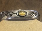 Vintage Native American Chrysoberyl Cat's Eye Stamped Sterling Cuff Bracelet — photo 1