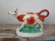 Victorian ceramic Staffordshire cow creamer. Circa 1860.