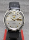 Vintage Seiko 5 automatic day date movement number 7009A japan made Men's Watch.