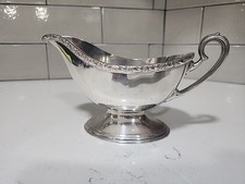 Ancien bateau à sauce en plaqué argent  