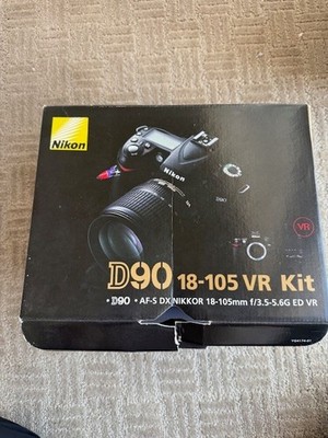 Nikon D D90 12.3MP Digital SLR Camera - Black (Kit w/ VR 18-105 mm Lens)