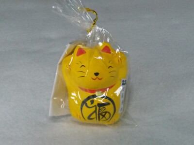 Yasui shrine yellow beckoning cat Papier omikuji doll amulet / in Osaka Japan　