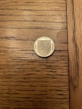 2012 *RARE** £1 Coin - Shield of Arms 