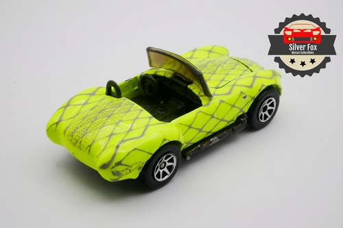1962-67 SHELBY COBRA VERDE SCALA 1:64 PRESSOFUSO DIORAMA MODELLINO AUTO DA COLLEZIONE - Foto 9 di 10