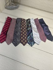 assorted men's silk neckties in various patterns and colors.