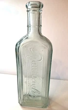Antique Rawleigh's Trademark Embossed Clear Glass Medicine Bottle