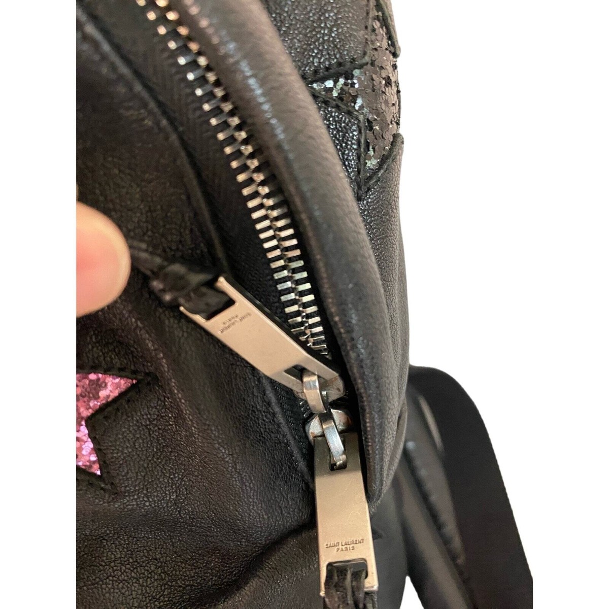 Saint Laurent, black canvas backpack with silver leather star detail. Saint Laurent Ysl City Star Embossed Backpack in Black for  main image 2