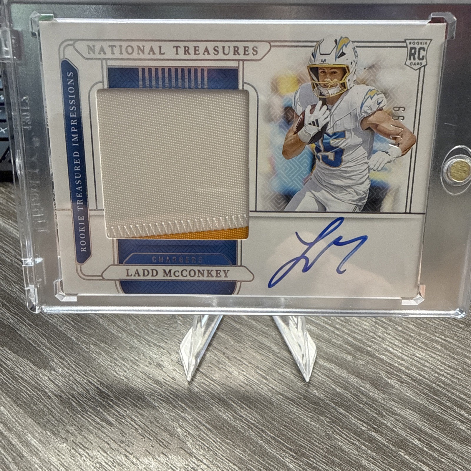 2024 National Treasures Ladd McConkey Rookie Treasured Impressions /99 RC Auto