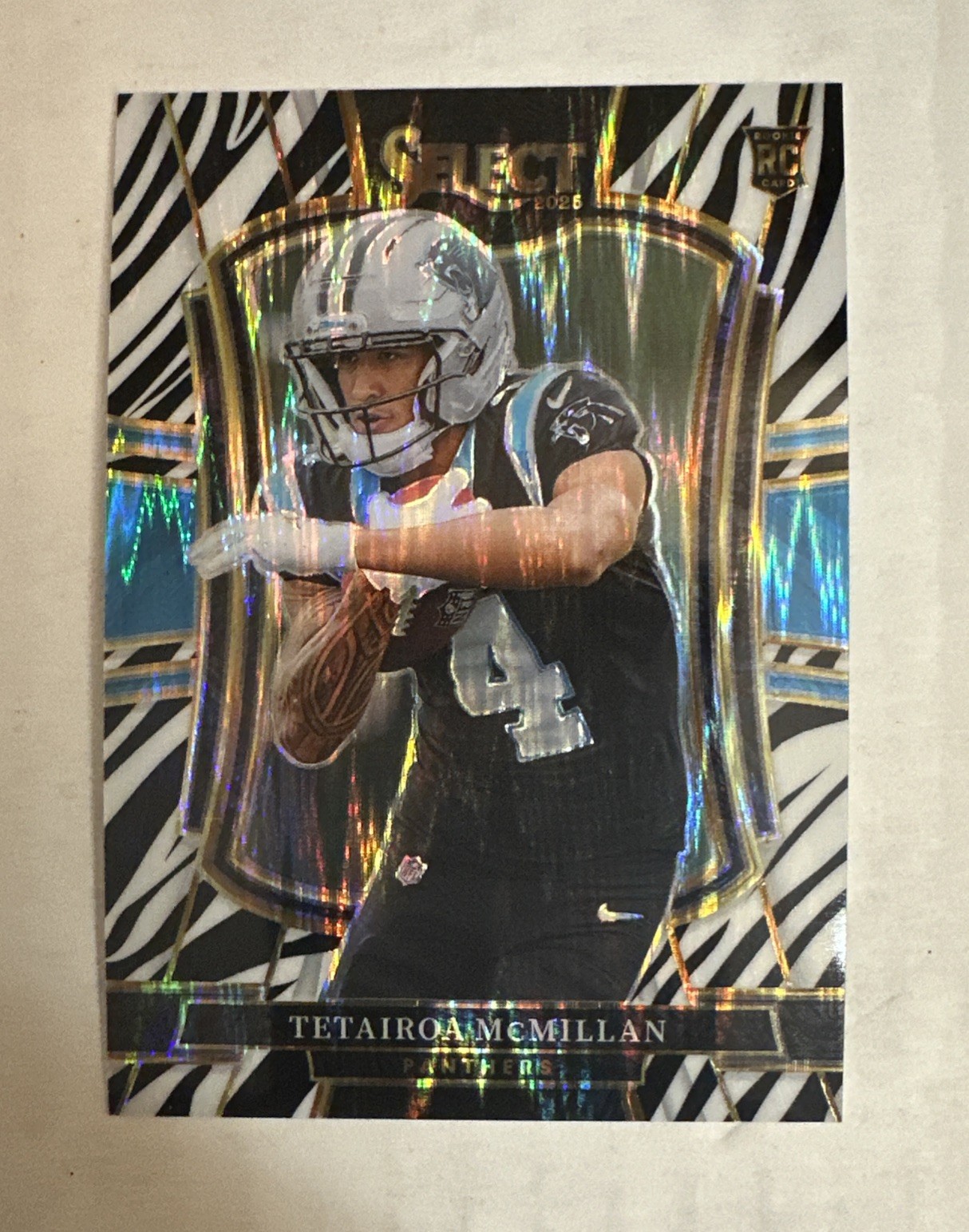 2025 Panini Select Tetairoa McMillan Zebra Shock Premier Level #144. RC Panthers