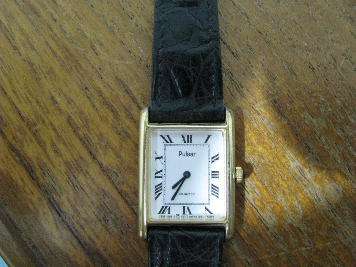 DAMENUHR PULSAR BASE METAL BEZEL GOLD BANG SUISSE