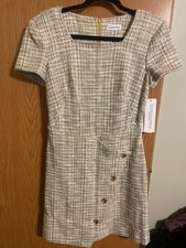 Very good calvin klein kitted gold white and black short dress