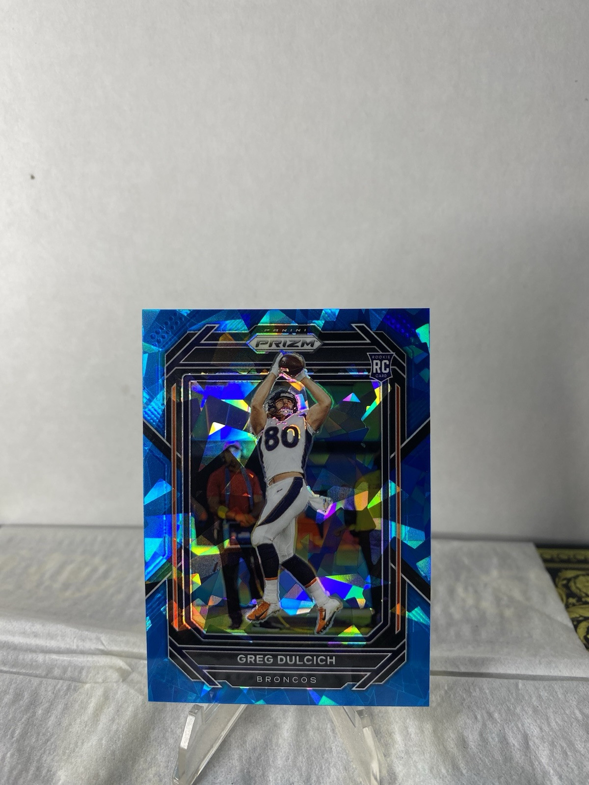 2022 Prizm Blue Ice Prizms Greg Dulcich RC /99 Denver Broncos #360