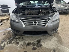Used Front Bumper Assembly Front fits: 2015 Nissan Sentra w/o fog lamps FE Front