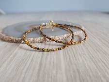 Bracciali fatti a mano con perline e pietre preziose rotonde sfaccettate occh...