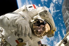 Astronaut During a Spacewalk Repair ISS STS-121 Earth Photo Poster Art Print