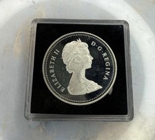 1984 CANADA UK Queen Elizabeth II Canoe in Toronto 150Y Toned Proof Silver Coin