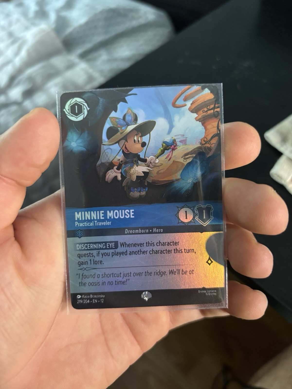 Minnie Mouse - Practical Traveler (Epic) 219/204 Wilds Unknown Holo