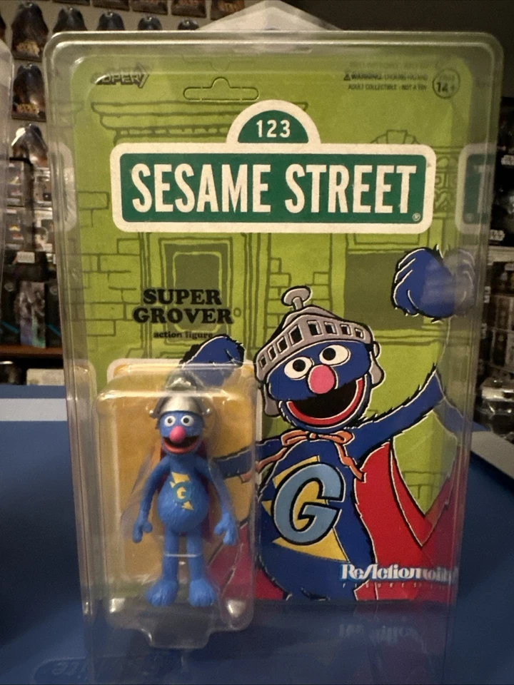 Figuras de reacción Super7 Plaza Sésamo Oscar el Gruñón y Super Grover nuevas Foto 3 de 4