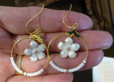 White Flower Dangle Hoop Earrings.