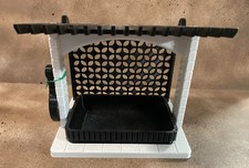 3D Printed hanging bird feeder for outdoors with hook and removable food tray.