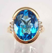 3 Ct Oval Cut Lab-Created Blue Topaz Engagement Ring 14K Yellow Gold Plated