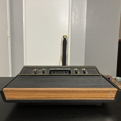 Atari 2600 4 Switch Woodgrain Console!! Works Great!! Tested Console Only