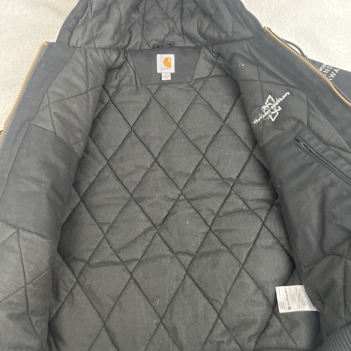 Carhartt 103940-BLK Black Duck Canvas Quilted Hooded Jacket Carhartt 103940-BLK Black Duck Canvas Quilted Hooded Jacket