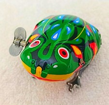 2025 Tiaowa Wind Up Green HOPPING TIN FROG Colorful Lithograph Design All Over