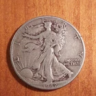 1942 SILVER WALKING LIBERTY HALF DOLLAR - CIRCULATED 90% SILVER  .50 CENTS