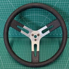 Grant 3-spoke Steering Wheel With Black Rubber Grip And Silver Metal Spokes. Grant 3-spoke Steering Wheel With Black Rubber Grip And Silver Metal Spokes.