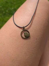Bronze bird circlet charm pendant on black 17-19 inch necklace