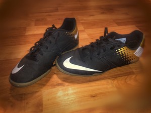 black and gold turf shoes