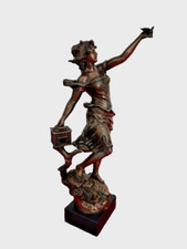 Statuette en régule signée Géo Maxim (1885-1940) intitulée "Message"